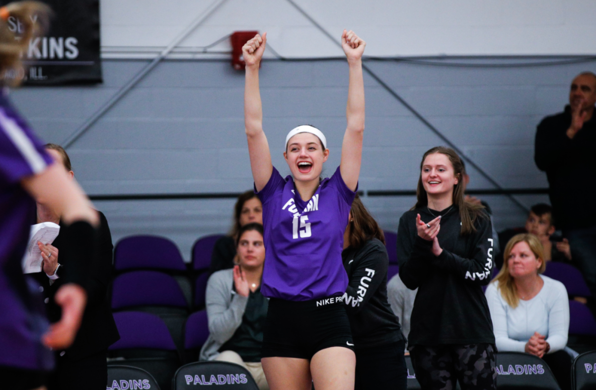 Lydia Morris was a star on Furman's volleyball team. Now she is an assistant coach at Woodward Academy.