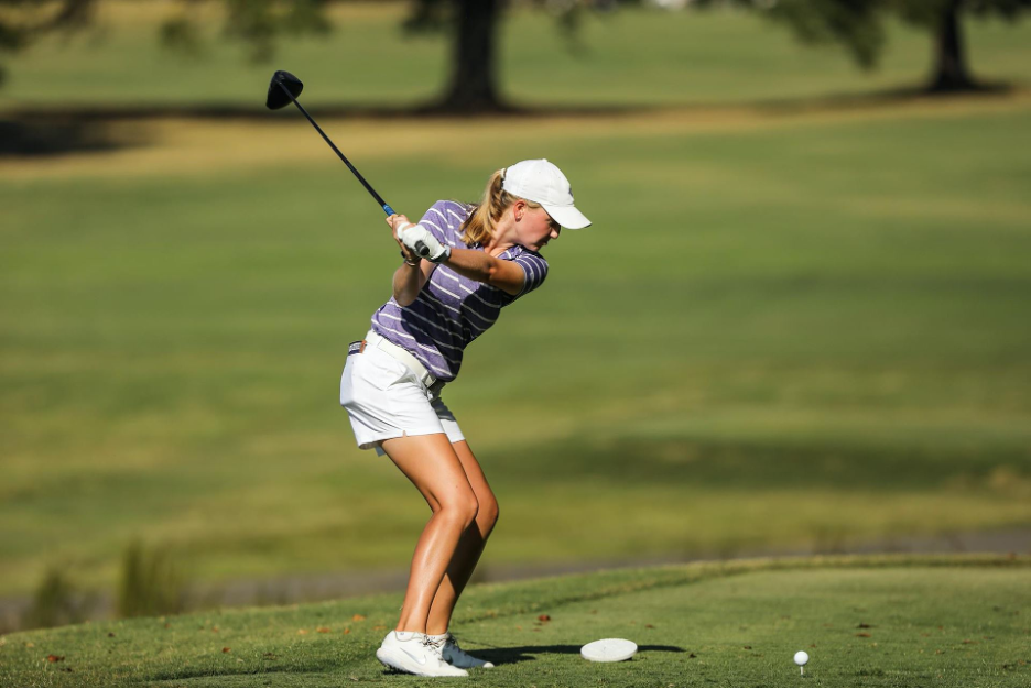 Sophomore Anna Morgan tees off at Furman Golf Club. Her success should be celebrated by in-person fans this spring.