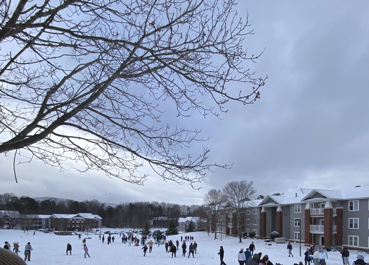 Students gathering for an all-campus snowball fight advertised by word of mouth.