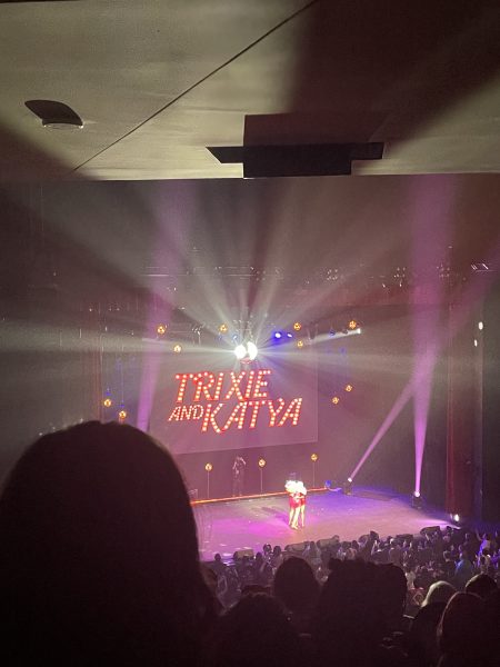 A photo of Trixie (left) and Katya (right) hugging at the end of their performance.