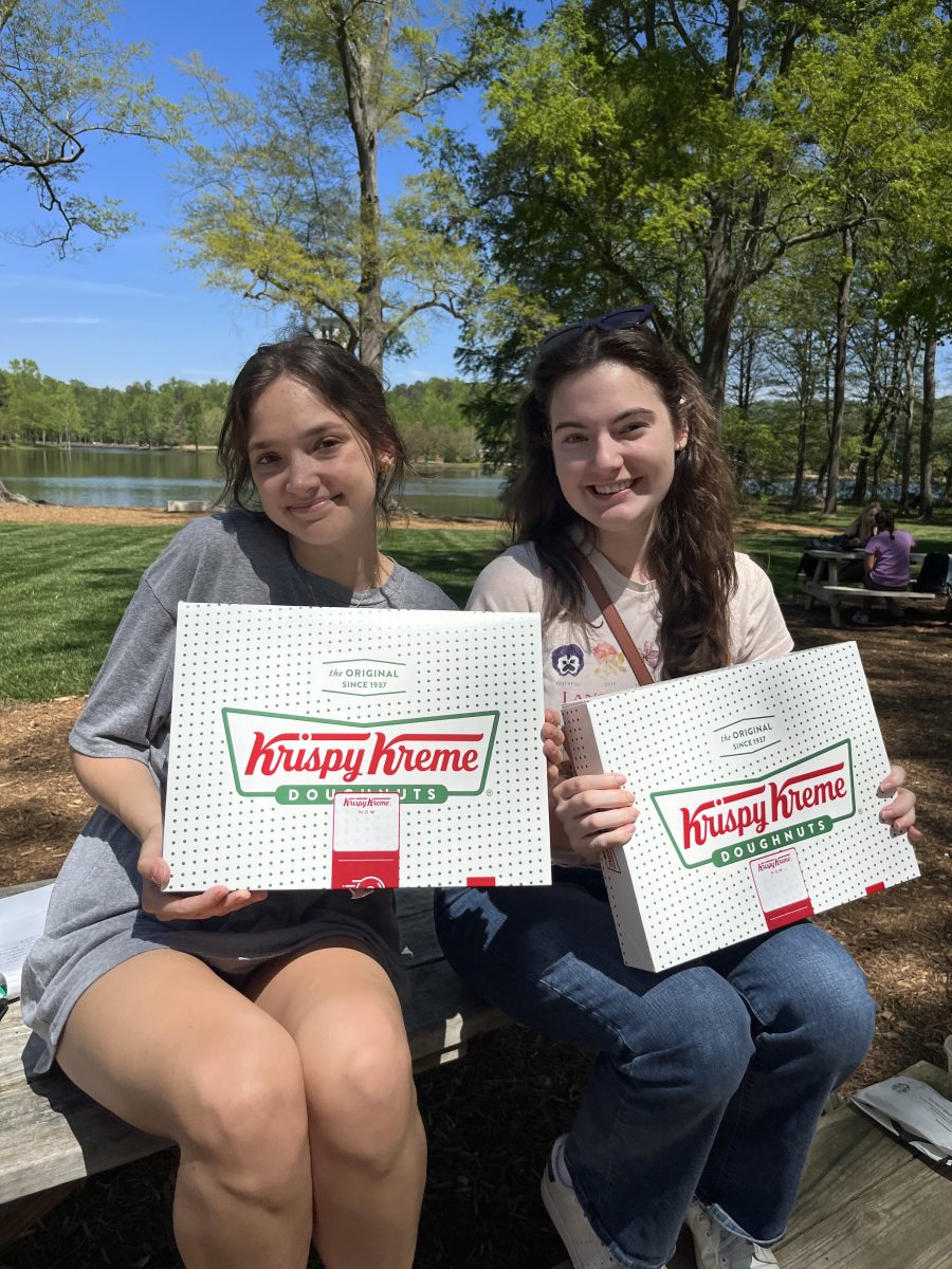Eco Reps Kate Bostick and Annie Lucas at the donut celebration.