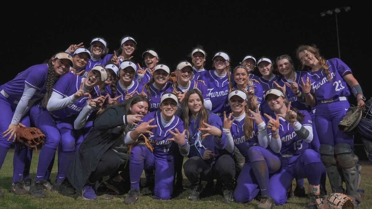 Furman softball celebrates a 3-2 win over IUPUI in the 2024 home opener thanks to a sixth-inning blast by senior Hannah Poole. 