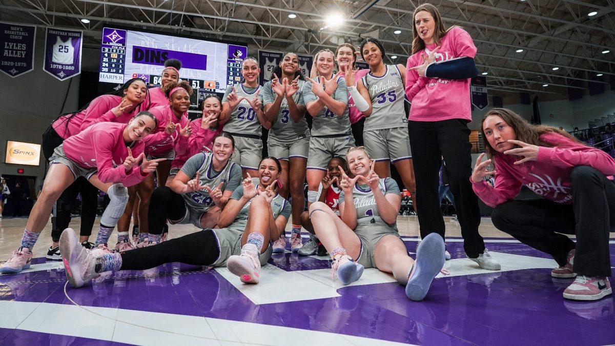 Furman celebrates a 64-51 victory over rival Wofford in the annual Play4Kay game on Feb. 16.