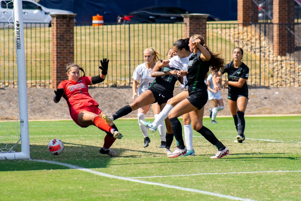 Maddie Massie scoring Furman's second goal.