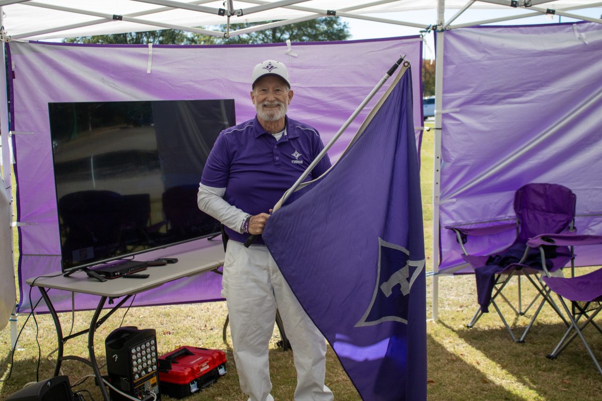 Michael Cheatham with the famous flag.