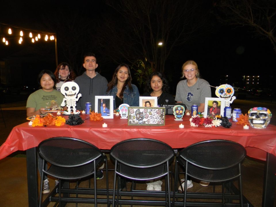 Members of HOLA host a Day of the Dead event.